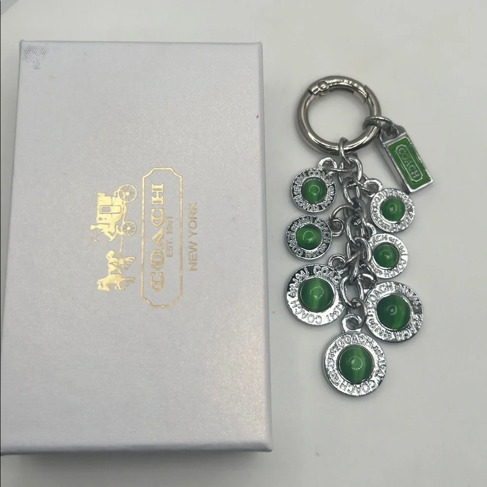 036.Silver and Green Keychain. Box included.